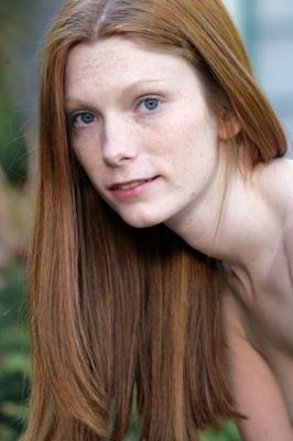 Innocent looking redhead Amelia shows off pale body