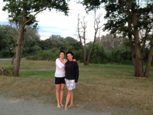 Mother Teaching Daughter On Vacation